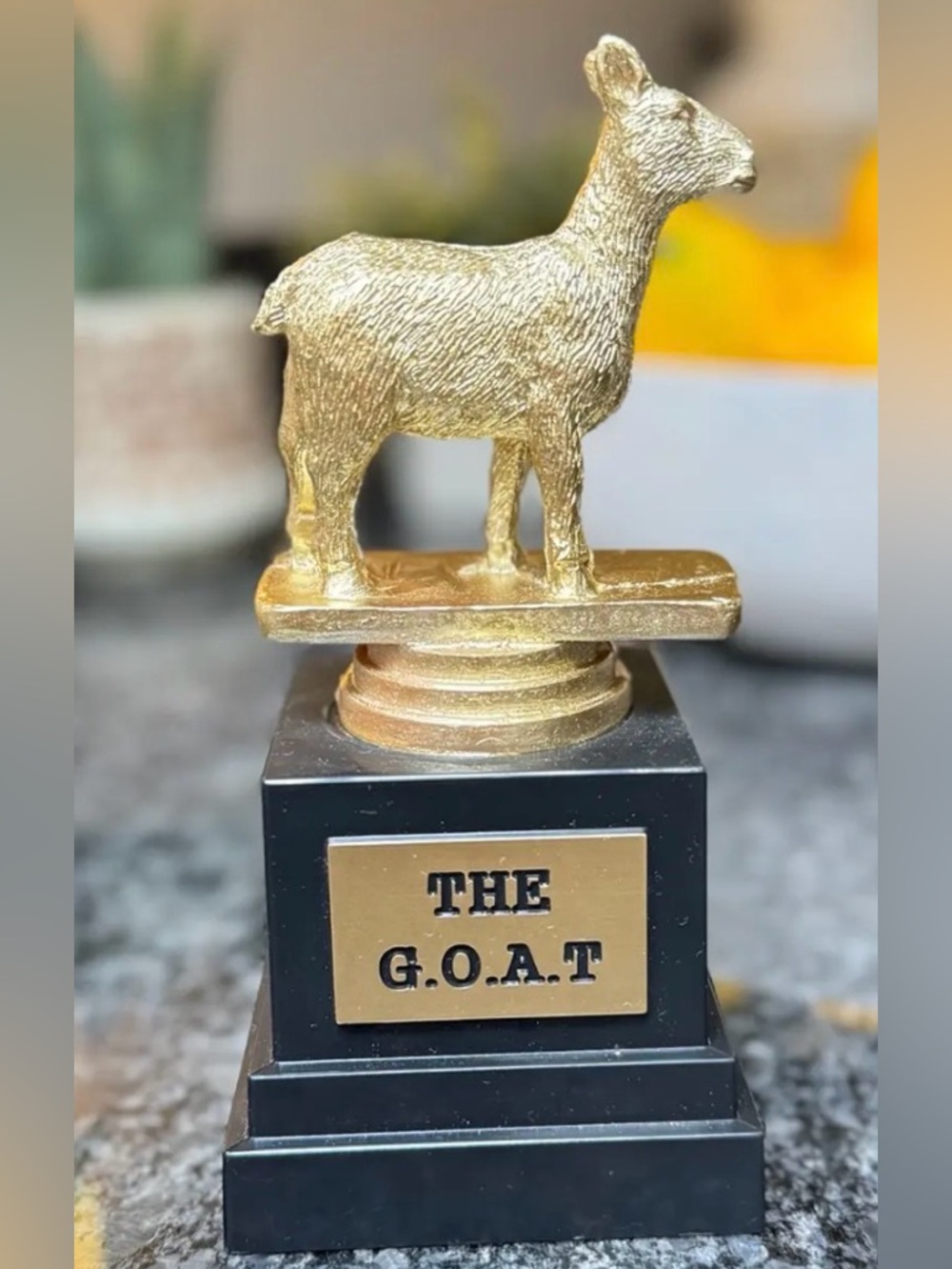 Gold ‘The G.O.A.T.' Trophy Award
